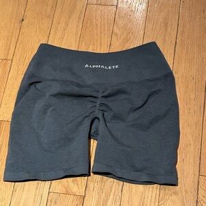 Alphalete Black Athletic Shorts with Snug Fit and Streamlined Design